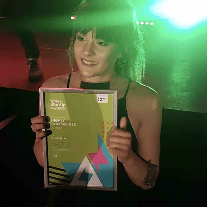 Emily accepting her Wales StartUp Award in 2019.